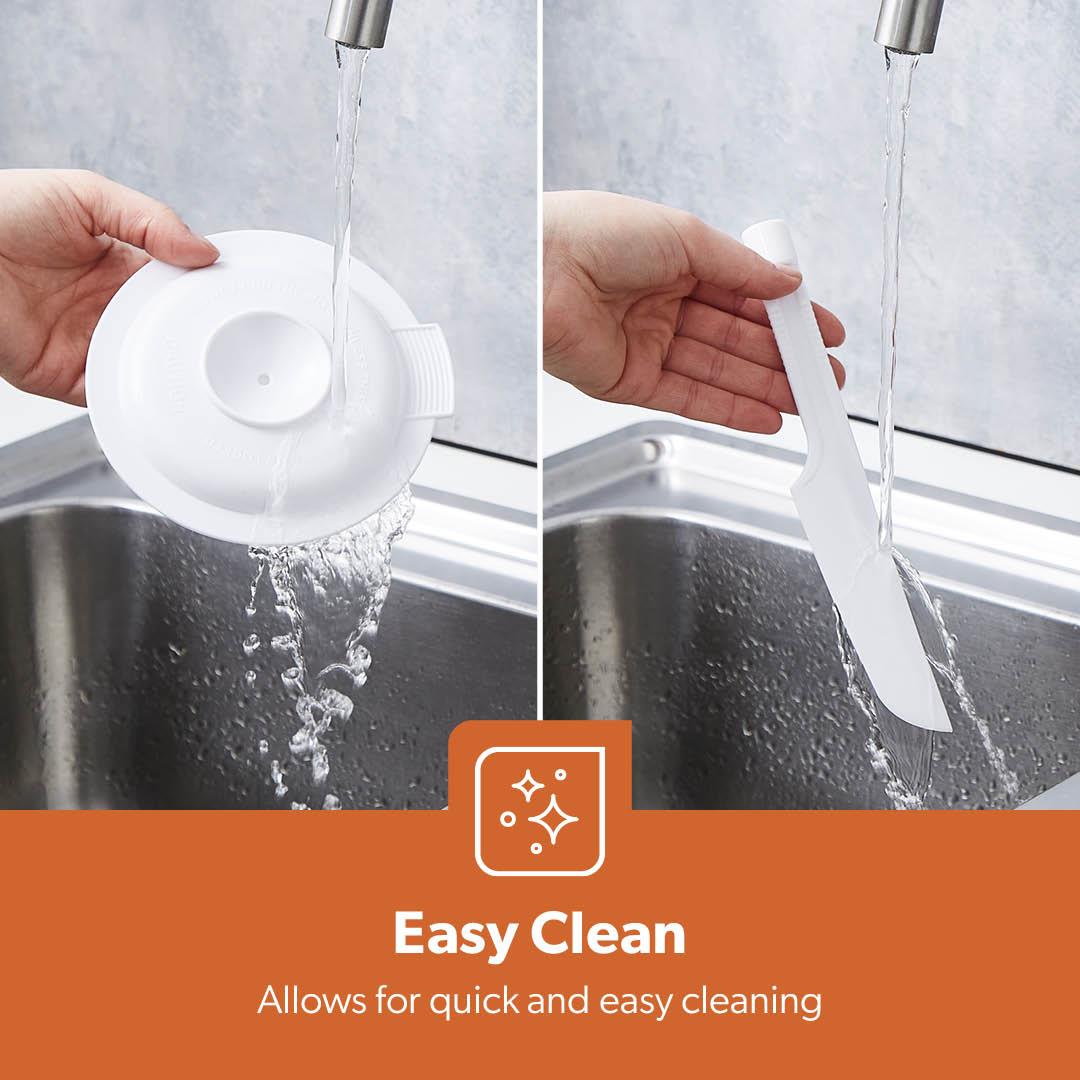 Two hands holding a white plastic component under running water in a sink, with an 'Easy Clean' label below.