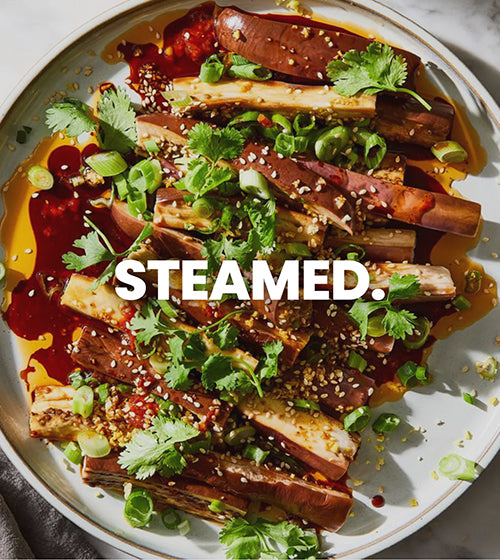 The image shows a dinner plate with a steamed meal on it for the steamed appliance product collection