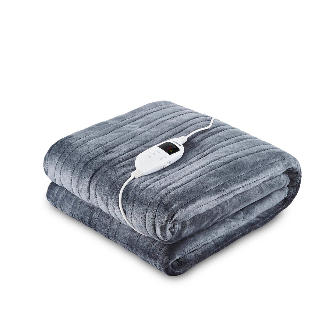 Gray electric blanket with a white plug on a white background