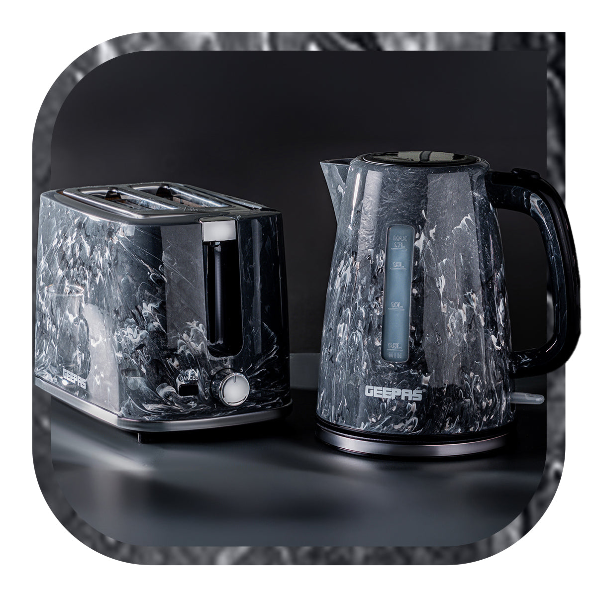 The image shows off the black Skye collection matching kettle and toaster set on top of a black kitchen countertop.
