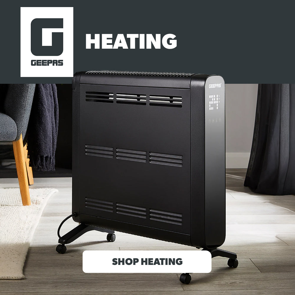 Black heating radiator in a room with 'HEATING' text and logo.