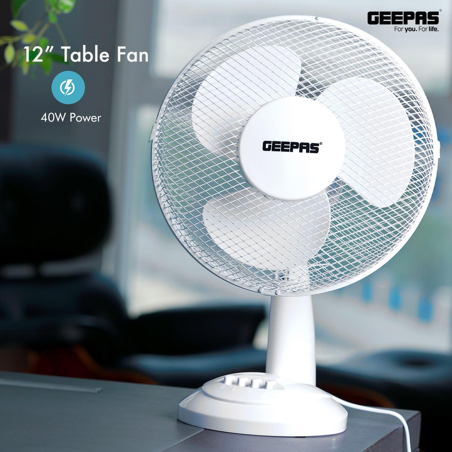 Two White 12" Oscillating Electric Table Fans