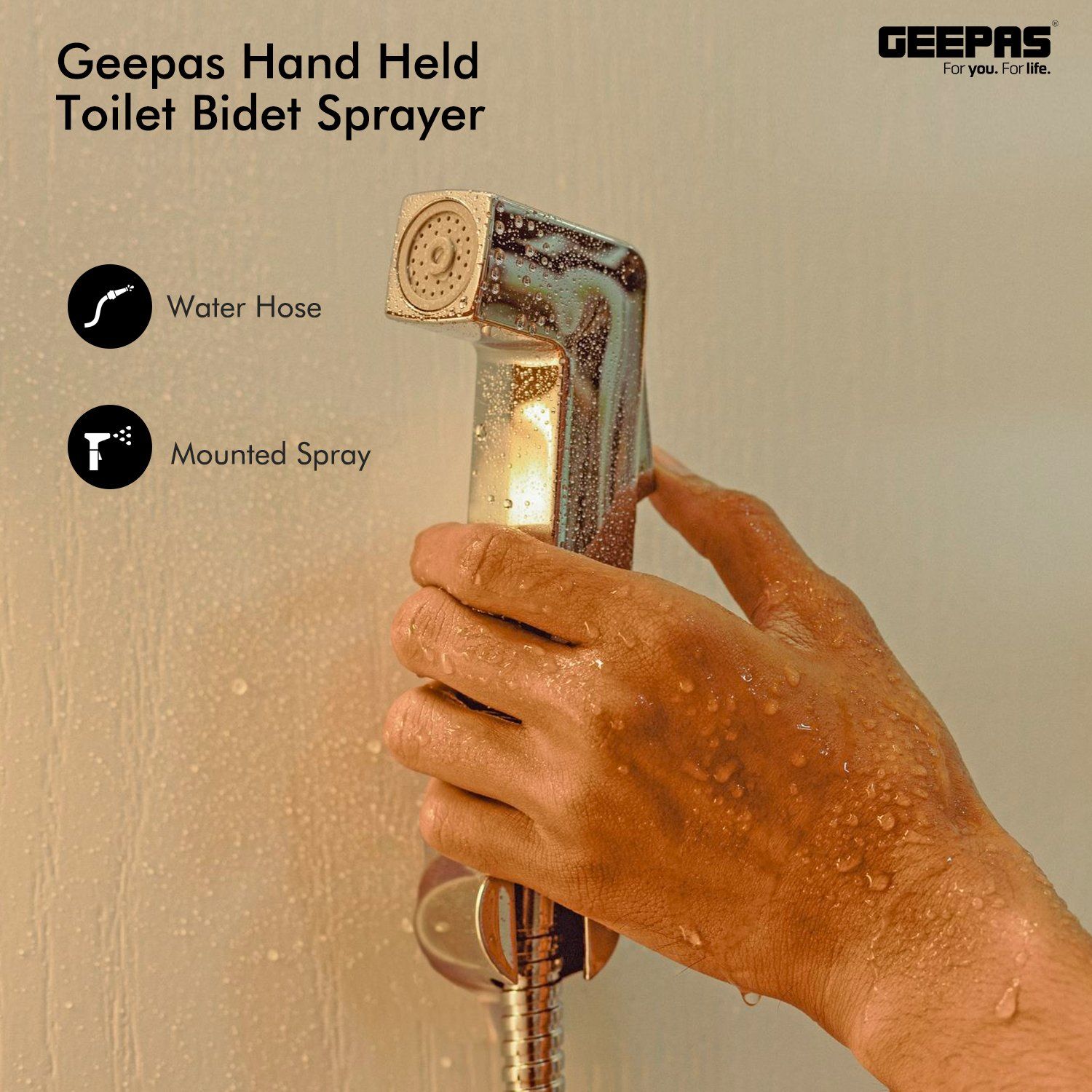 The image shows the toilet bidet sprayer on a handle on the bathroom wall besides the toilet.