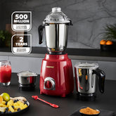 Red blender with additional jars on a kitchen counter, featuring GEEPAS branding.