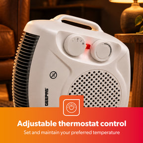 The 2000W upright electric fan heater in a livingroom besides a night stand table showing off the adjustable thermostat control function on the fan heater.
