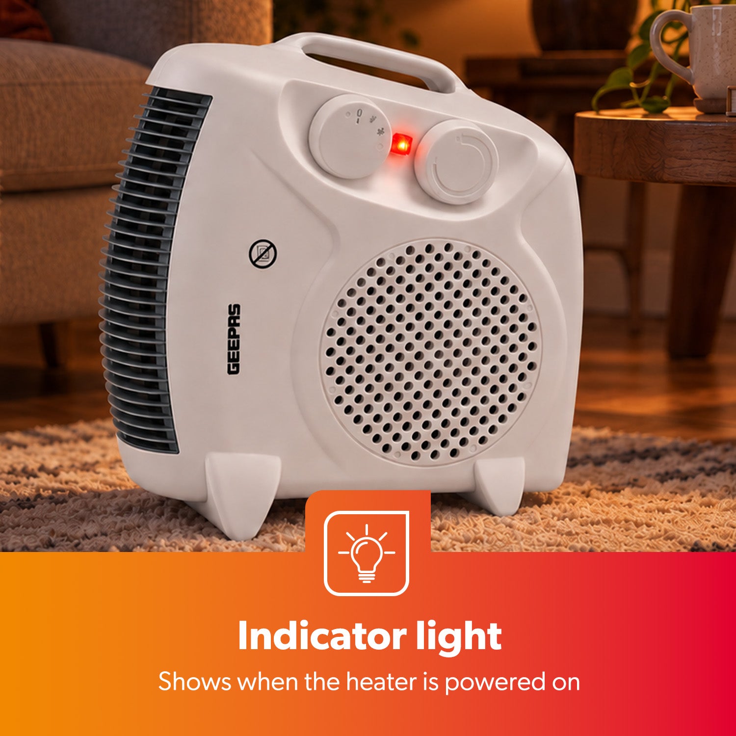 A compact white GEEPS electric heater with a handle, front grille, and two control knobs, shown on a carpeted floor in a living room setting. An orange banner at the bottom highlights the indicator light.