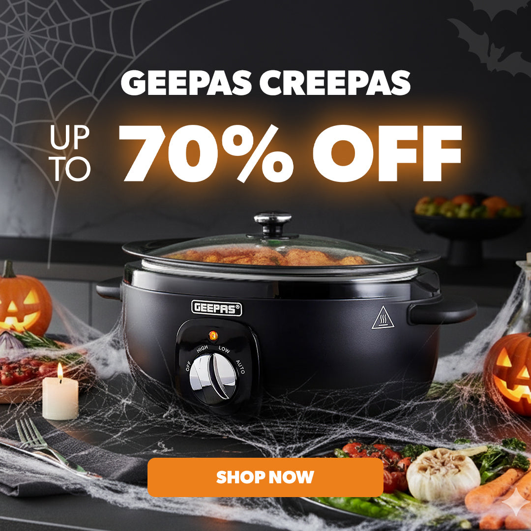 Black GEEPAS slow cooker on a Halloween-themed background with pumpkins and spider webs.
