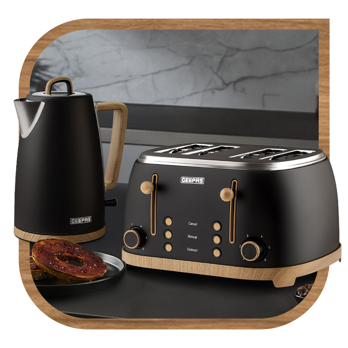 Nordiq black kettle and toaster set on top of a kitchen countertop.