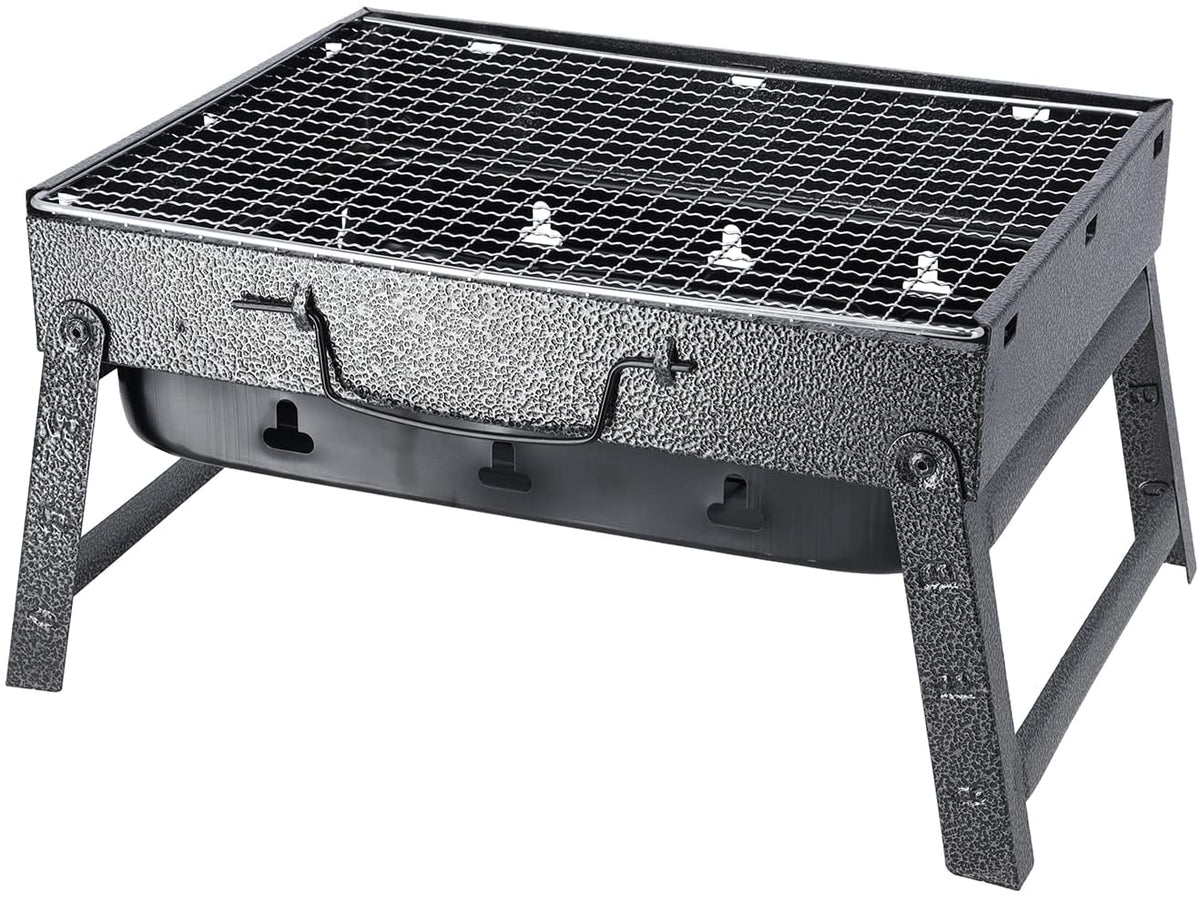 A black charcoal barbecue grill with a grilling net placed on top.