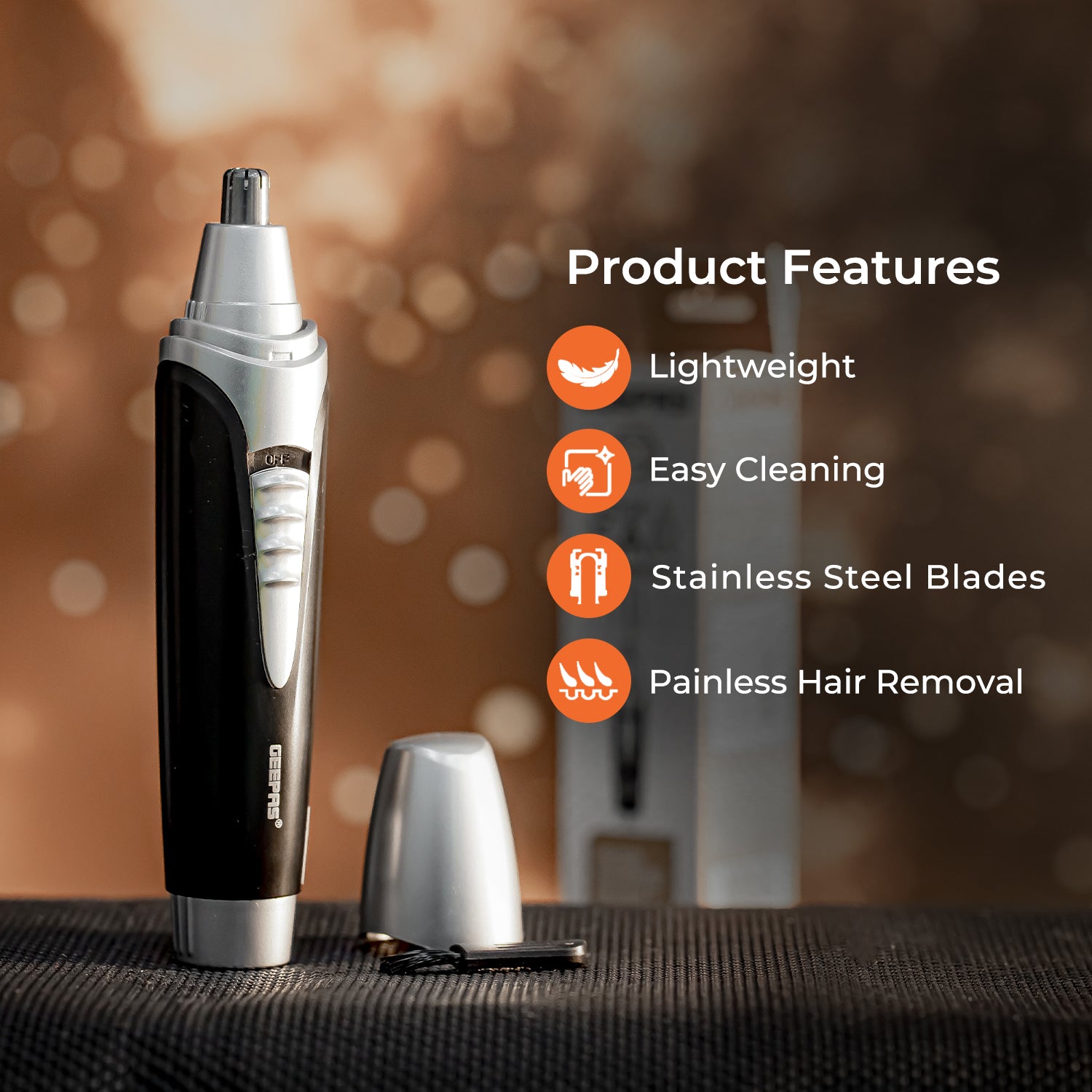 This image shows off the men's nose and ear hair trimmer on a canvas material, you can see shiny lights in the background. The image also shows off some of the most important product features such as being lightweight, easy cleaning, stainless steel blades and painless hair removal.